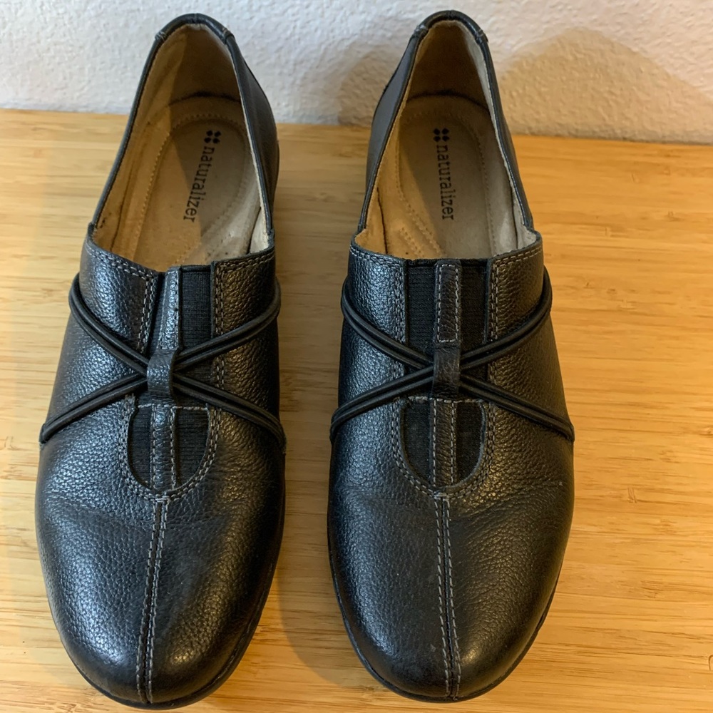 Naturalized. Black. Slip on. 8N.  Maybe worn once.